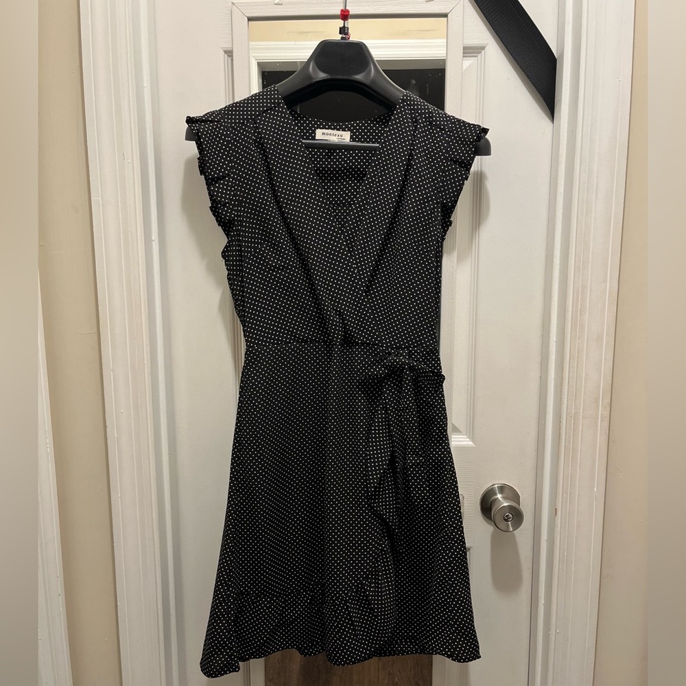 Monteau black with cream polka dots dress.